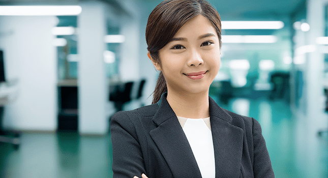 An Employee Benefits account manager working in an office